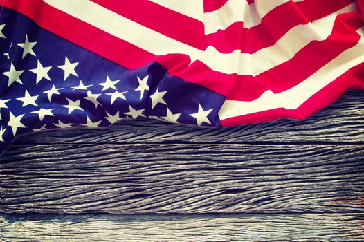  American flag on wooden background retro effect image