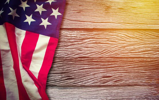  American flag on wooden background retro effect image