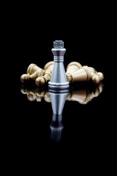King of chess or Chess King with reflection glass on black background. Chess game, business, competition, leadership and success concept