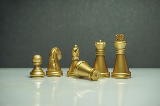 Piece of chess or Chess pieces with reflection glass on black background. Chess game, business, competition, leadership and success concept