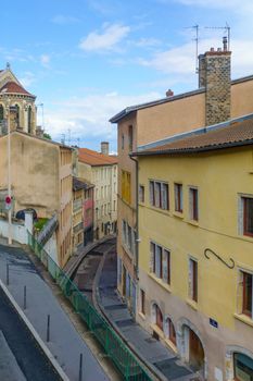 View of a winding alley in the old city of Lyon, France