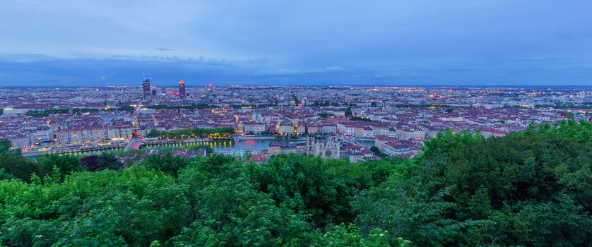 The Saint-Jean cathedral, Saone River and the city center, at evening, in Lyon, France