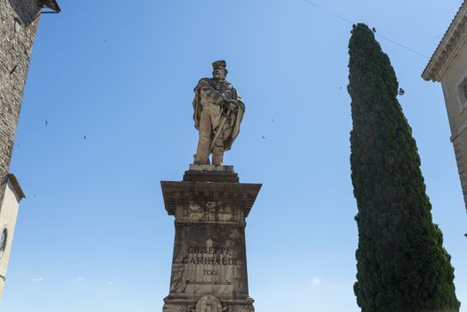 todi,italy june 20 2020 :Garibaldi monument in the center of the Garibaldi square in Todi