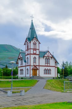 View of the church of the fishing town Husavik, northeast Iceland
