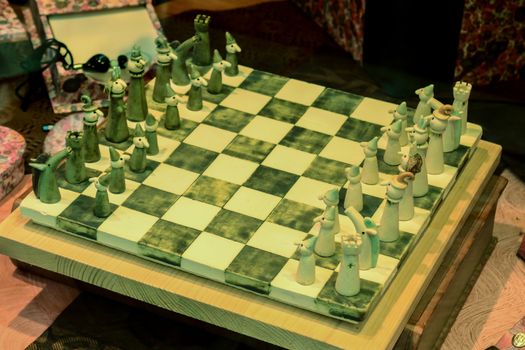 Beautiful Italian handmade wooden chess on chessboard