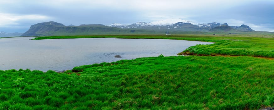 Panoramic landscape and the Snaefellsjokull volcano, in the Snaefellsnes peninsula, west Iceland
