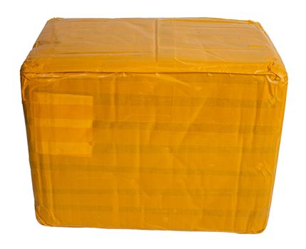 cardboard parcel box whole wrapped with yellow sticky tape isolated on white background.