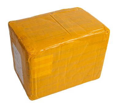 cardboard parcel box whole wrapped with yellow sticky tape isolated on white background.