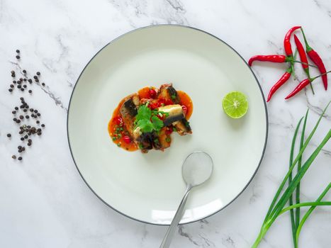 Canned Fish Salad,Thai food Ingredients Fish,Chilies,Lime,Spring onions,Pepper,Coriander,Hot sauce and tomatoes,Is a healthy food,White background