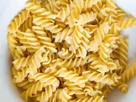 Fusilli boiled In a white bowl Use as wallpaper