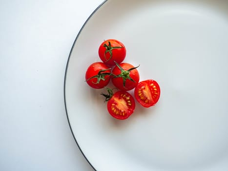 Red tomatoes Put on dish White,Food for healthy,white background