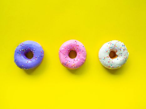 Donuts various flavor have color Orange White Purple Pink,High energy foods and healthy rates,Sweet flavored candy,Mapping background