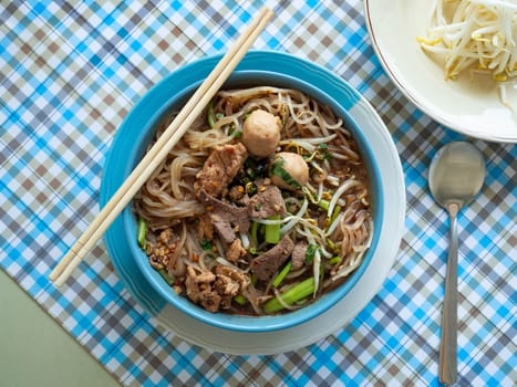 Thai food Noodle name is Ayutthaya Boat Noodle,Famous food in Thailand,Include Thin rice noodles Pork ball Pig liver and Vegetable
