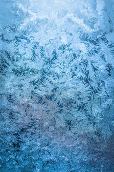 Frosty natural pattern on winter window