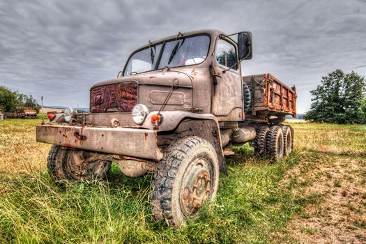 Image of the abandoned old rusty truck - terrain truck Praga V3S from 1953