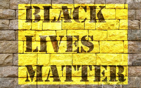 Black Lives Matter slogan text liberation banner designs stencil yellow stencil brick wall background texture stone