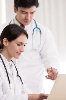 Two doctors have working together with happiness in the hospital.