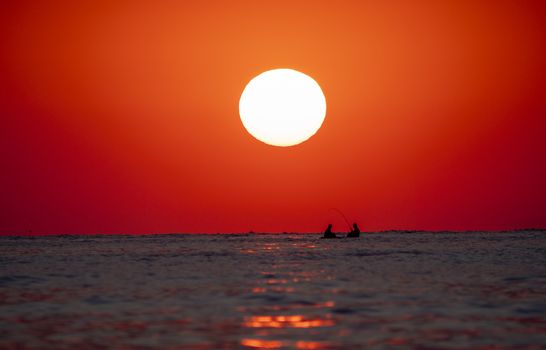 big sun down over sea sunrise, red sky