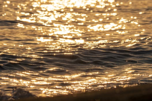 Early morning, dramatic gold sunrise over sea