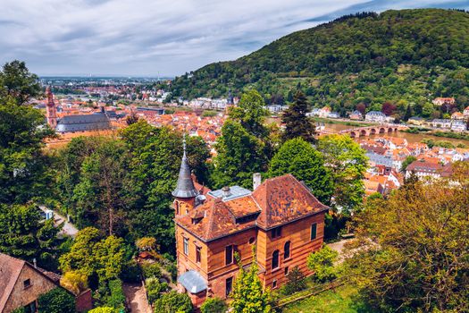 Panoramic view of beautiful medieval town Heidelberg including Carl Theodor Old Bridge, Neckar river, Church of the Holy Spirit, Germany