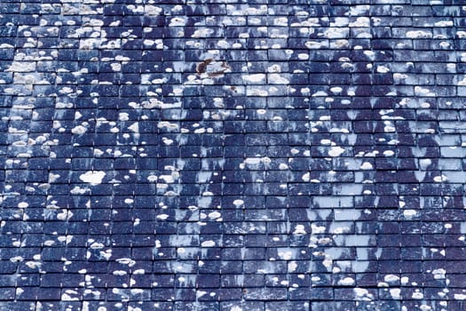 Background of old stone roof tiles