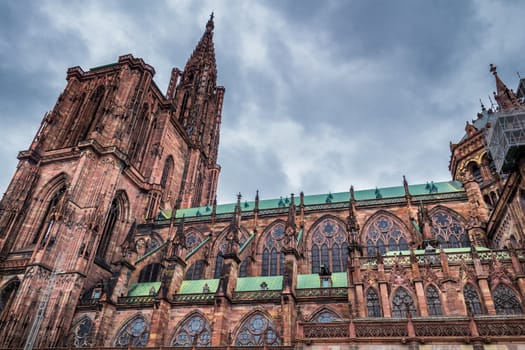 Huge tower and elegant exterior architecture of Notre dam of Strasbourg cathedral in Strasbourg, France