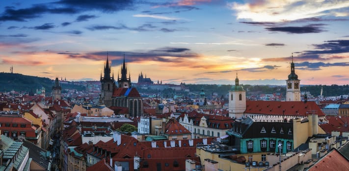 Aerial view over Church of Our Lady before Tyn, Old Town and Prague Castle at sunset in Prague, Czech Republic
