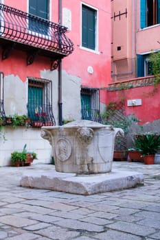 Typical water well in in Cannaregio, Venice, Veneto