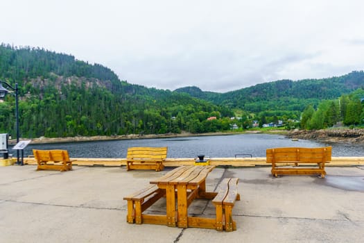 Pier and landscape of the Saguenay Fjord in Sainte-Rose-du-Nord, Quebec, Canada