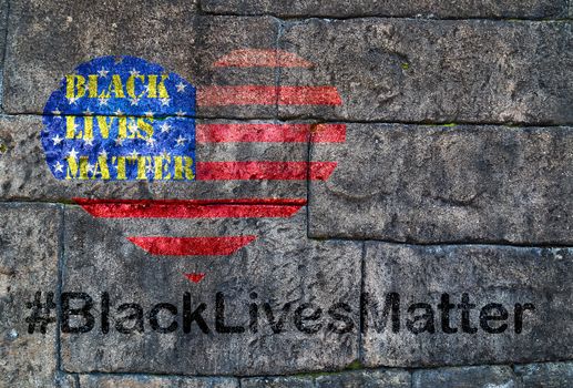 Black Lives Matter hashtag protestors anti Black racism african american people heart on United States flag stencil city street Old brick wall background texture stone black
