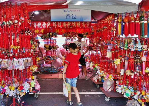 KAOHSIUNG, TAIWAN -- JUNE 7, 2019: A street vendor sells scented sachets in various shapes and designs.