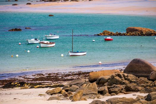 Boats in the port on the Pink Granite Coast (cote de granite rose in french). Brittany (Bretagne), France