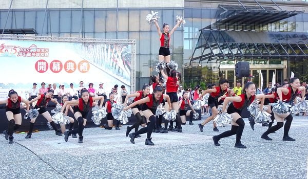 KAOHSIUNG, TAIWAN -- JUNE 17, 2015: Students from the Shu-Te High School perform a free outdoor dance for the start of the Dragon Boat Festival.