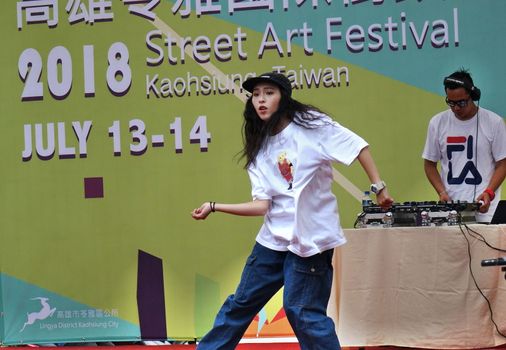 KAOHSIUNG, TAIWAN -- JULY 14, 2017: A female dancer participates in the hip-hop competition at the 2018 Street Art Festival.
