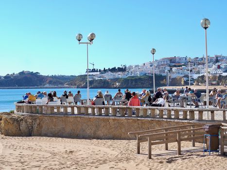 People sunbathing at the Inatel hotel in Albufeira in Portugal