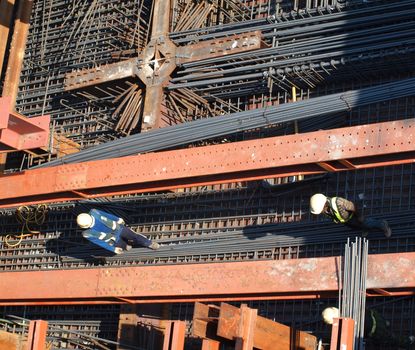 KAOHSIUNG, TAIWAN -- AUGUST 4: Workers inspect part of the Kaohsiung Light Rail System construction, the first phase of which will be operational in 2014, on August 4, 2013 in Kaohsiung.
