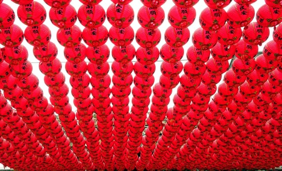 KAOHSIUNG, TAIWAN -- AUGUST 12, 2015: Multitudes of red lanterns decorate the courtyard of the Tian Hou Temple on Chijin Island.
