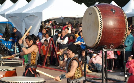 KAOHSIUNG, TAIWAN - JANUARY 23: The Japanese percussion group TenDrum performs outside the Cultural Center for the Chinese New Year on January 23, 2012 in Kaohsiung