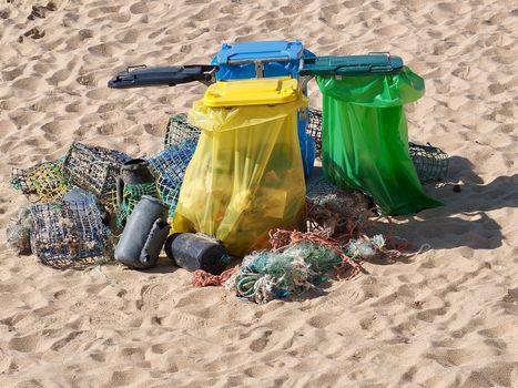 Waste separation at a beach with fish traps