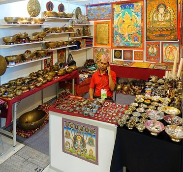 KAOHSIUNG, TAIWAN -- OCTOBER 8, 2015: A stall sells Tibetan religious artifacts at a local trade fair.
