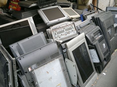 KAOHSIUNG, TAIWAN -- MAY 13, 2017: Stacks of old flat panel televisions are waiting to be shipped to recycling plant.