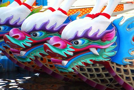 KAOHSIUNG, TAIWAN - JUNE 11: Decorated dragon boats on the Love River in Kaohsiung are ready for the Dragon Boat Festival on June 11, 2013 in Kaohsiung