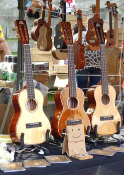 KAOHSIUNG, TAIWAN -- APRIL 23, 2016: Outdoor vendors sell musical string instruments at the 1st Pacific Rim Ukulele Festival, a free outdoor event.
