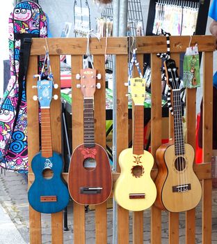 KAOHSIUNG, TAIWAN -- APRIL 23, 2016: Outdoor vendors sell musical string instruments at the 1st Pacific Rim Ukulele Festival, a free outdoor event.