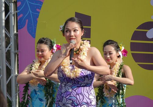 KAOHSIUNG, TAIWAN -- APRIL 23, 2016: A group of unidentified dancers performs a Hawaiian dance at the 1st Pacific Rim Ukulele Festival, a free outdoor event.
