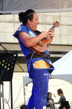 KAOHSIUNG, TAIWAN -- APRIL 23, 2016: Award-winning Japanese musician Yuta Uchiumi performs at the 1st Pacific Rim Ukulele Festival, a free outdoor event.