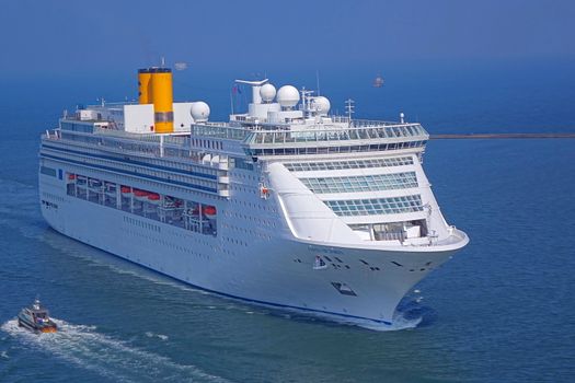 KAOHSIUNG, TAIWAN -- SEPTEMBER 12 , 2017: The luxury cruise liner Costa Victoria coming from Japan approaches Kaohsiung Port.