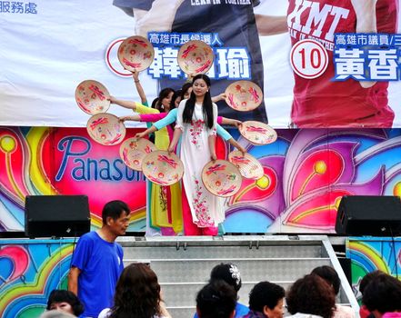 KAOHSIUNG, TAIWAN -- NOVEMBER 10, 2018: Vietnamese new immigrants to Taiwan perform a dance at an election rally.
