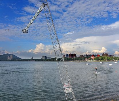 KAOHSIUNG, TAIWAN -- MAY 25, 2014: A cable powered wakeboarding park has been set up in the Lotus Lake in Kaohsiung.