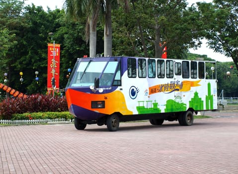 KAOHSIUNG, TAIWAN -- OCTOBER 13: A special amphibious city bus transports visitors to the yearly Wannian Folklore Festival on October 13, 2013 in Kaohsiung.